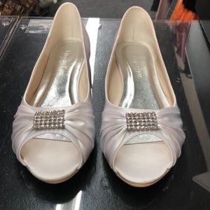 Size 41(fits more like a 10) white bridal flats